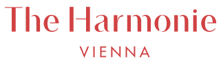 Logo des Boutique Hotel The Harmonie Vienna in Wien in roter Schrift